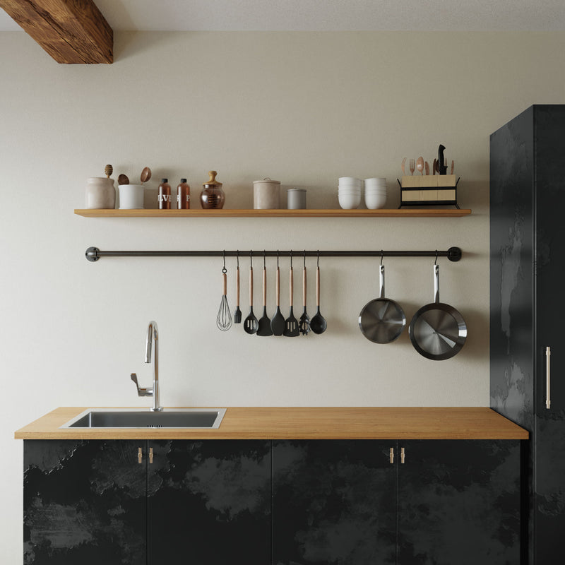 wall mounted iron pipe in the kitchen to hang pots and pans in reach over the counter