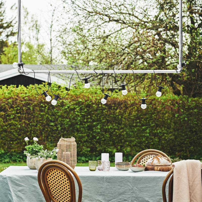 Silver iron pipes used to hang small lamps on the terrace rust free modern and simple 